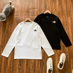 Hochwertige The North Face Langarmshirts aus weißer Baumwolle im klassischen Stil