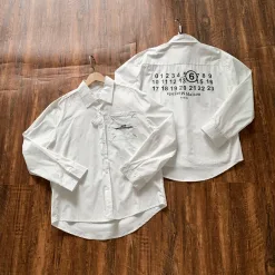 Bestseller: Langarm-Logo-Stil von Margiela