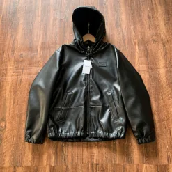 Luxus-Coach-Mäntel aus Leder im Monogramm-Stil