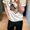 Premium-Kollektion mit kurzärmligen Denim-Stickereien von Louis Vuitton