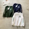Hochwertiges Lululemon Langarmshirt im Marine-Logo-Stil