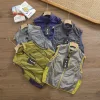 Bestseller Patagonia Weste im Gold-Logo-Stil
