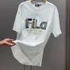 Luxuriöse Fila Kurzarm-Kollektion mit schwarzem Baumwolldruck