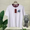 Bestseller der Gucci-Kollektion mit kurzen Ärmeln und weißem Print